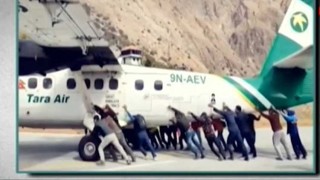 Passengers push plane off runway at Nepal airport