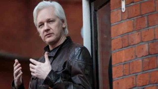 UK court formally issues order to extradite Assange to US