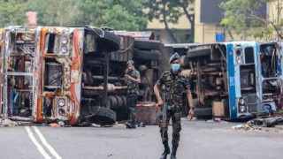 Shoot-on-sight orders in Sri Lanka after deadly violenc