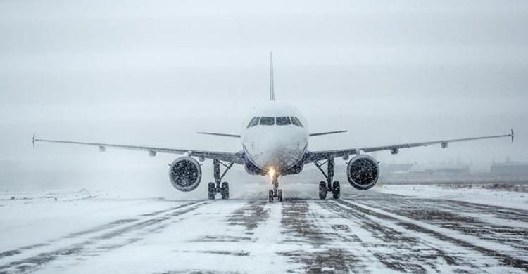 Flights canceled, at least 2 dead as ice storm freezes US